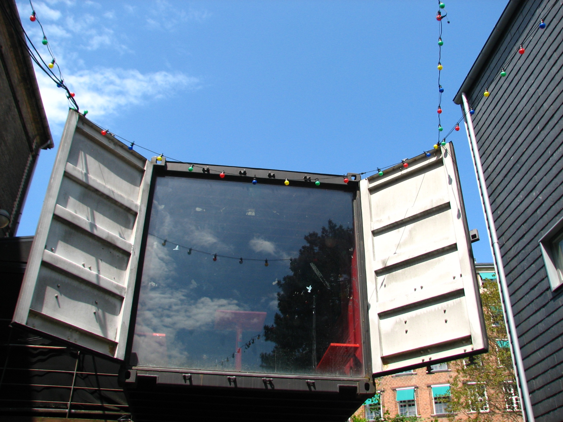 Glass-fronted shipping container at Pumpehuset